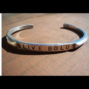 Sandy comstock sterling bangle.